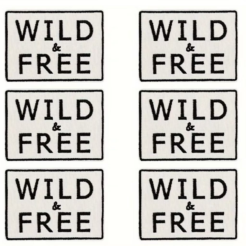 Six square 'WILD & FREE' patches arranged in a 2x3 grid on a white sheet, shown against a dark phone-screen background.