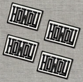 Four rectangular embroidered patches with the word 'HOWOU' in black outlined lettering on a white background, arranged on a gray textured surface.